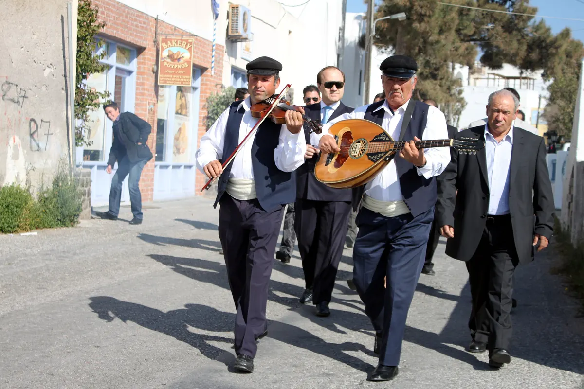 Musicians walking through town